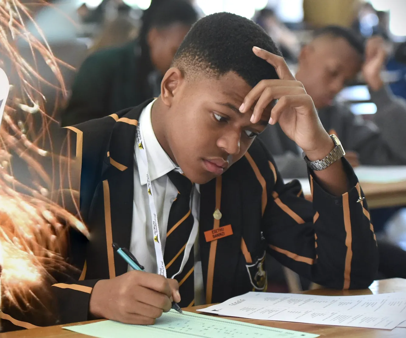 A scholar concentrating on the Scholar's Challenge